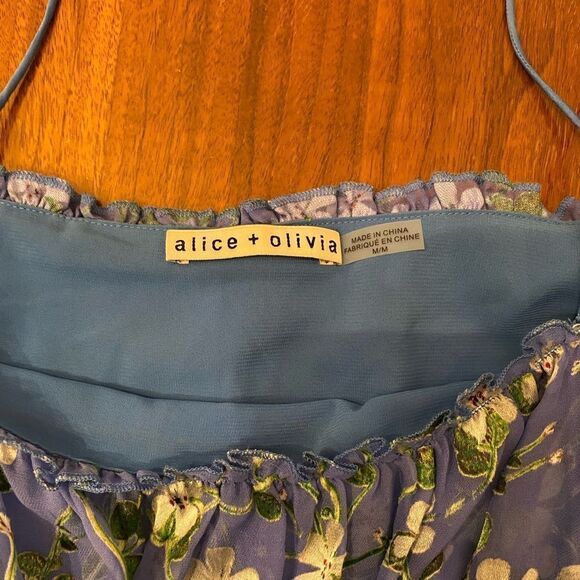 Alice + Olivia
Tia Floral-Print Ruffled Blue Blouse - Picture 9 of 11